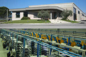 Il trasporto a nastri della tua azienda al sicuro con rulli gommati di qualità e Made in ITALY